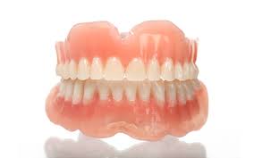 Getting dentures in Glendale: Examine the professionals and cons
