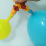 what happens as you pull down the balloon at the bottom of the model